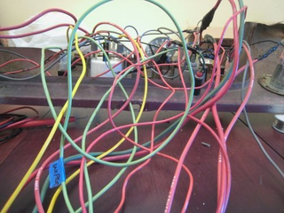 Illustration for article titled 20R-Powered Sprite Wiring Hell Nearly Complete: It Lives!